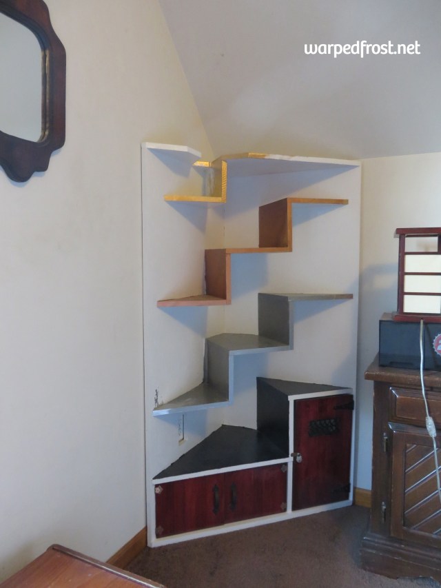 Unfortunately right now I can't move the little brown cabinet on the right so it's cramping The Alchemist's style a little bit.