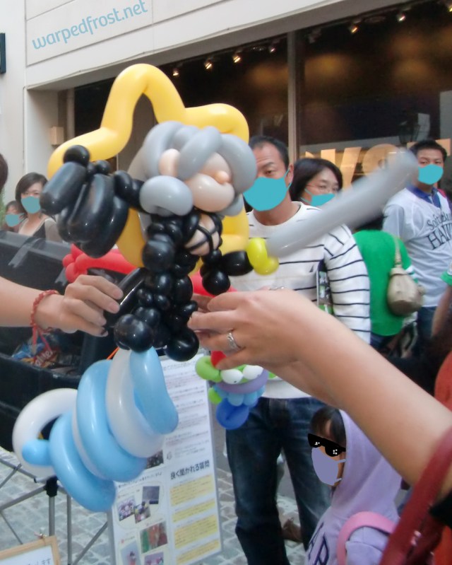 Photo shows Balloon Seph with added spirals of balloons at the bottom to give a sense of upward motion, as well as a star at his back.