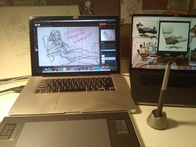 Photograph showing two MacBook Pro laptops and an old Wacom tablet. The old laptop has Photoshop and the line drawing open, while the new one displays reference images, mostly Eames lounge chairs.