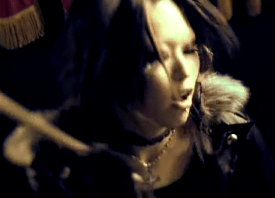 exist trace's drummer Mally drumming passionately in the music video for "Vanguard"